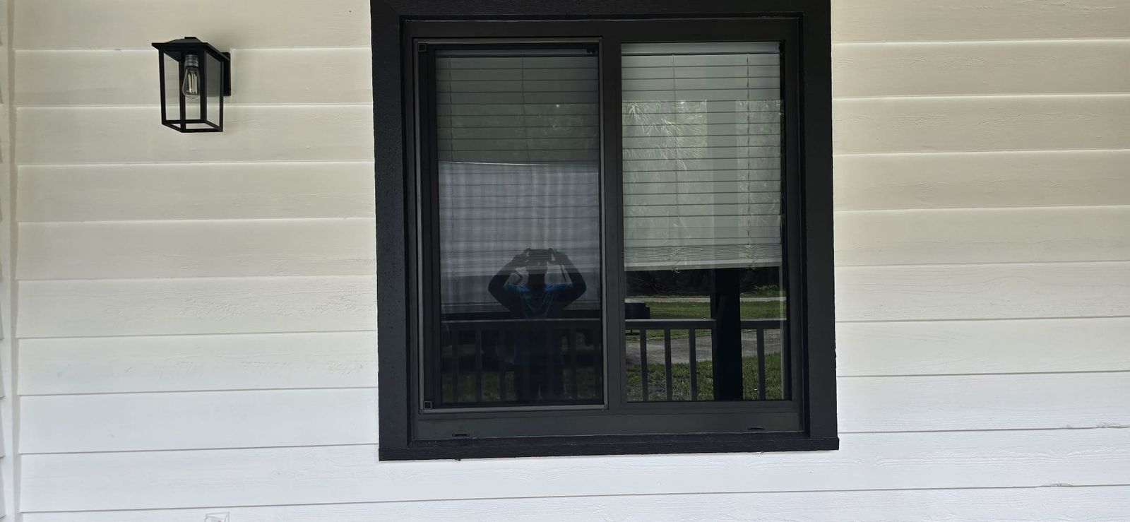 Large impact-rated windows on a Florida home with bright natural light